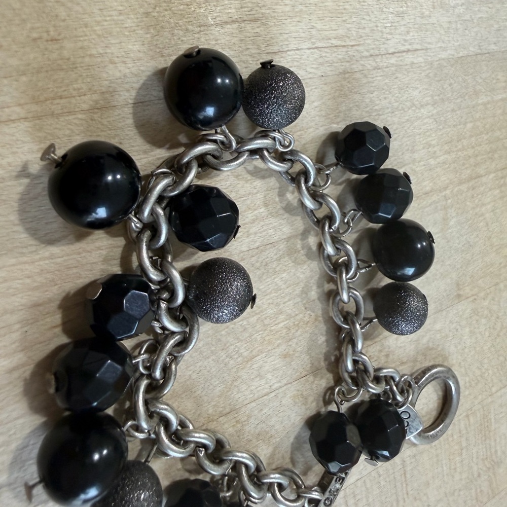 Elegant Black and Silver Charm Bracelet